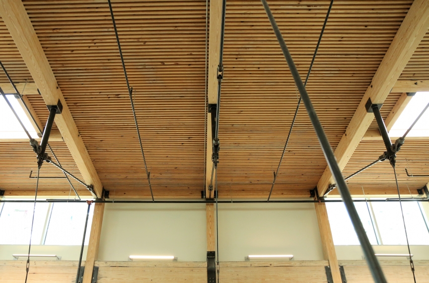 The exposed wood floor/ceiling assembly serves as a constant reminder that we can and should do more to advance equity in the built environment.