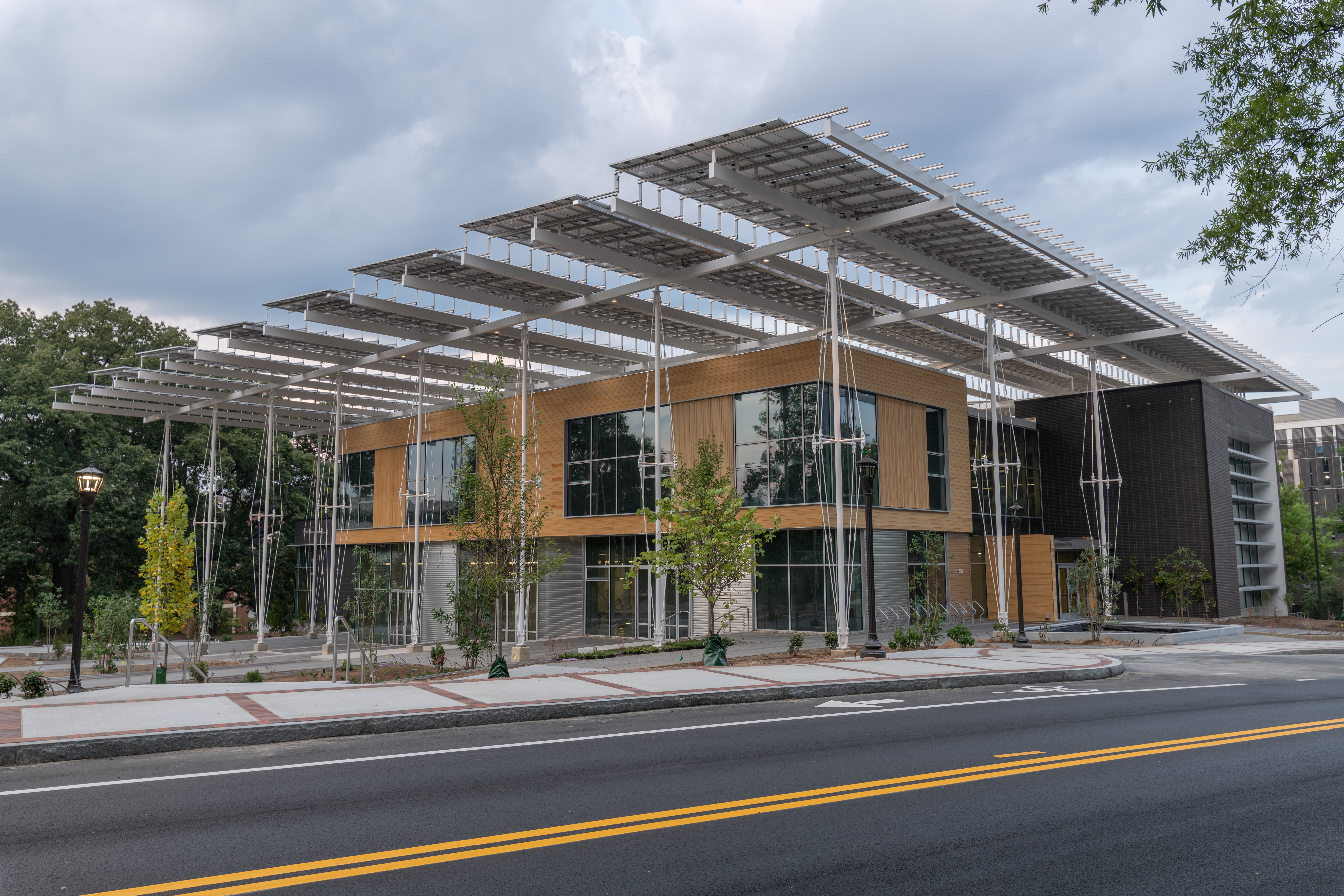 This imagine showcases two different approaches to the built environment. The street is made of impervious asphalt that turns rainfall into stormwater, which has to be channeled to sewer drains. In contrast, The Kendeda Building manages 90% of an average rainfall on-site.