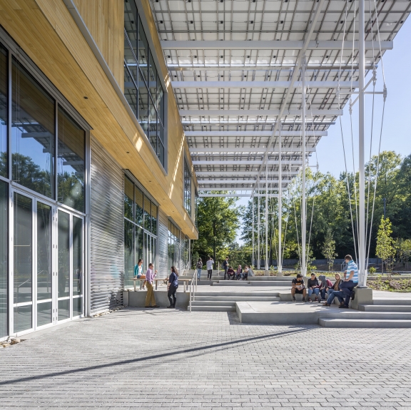 The front porch is a gathering place for students, staff, and visitors. Photo Credit: Jonathan Hillyer.
