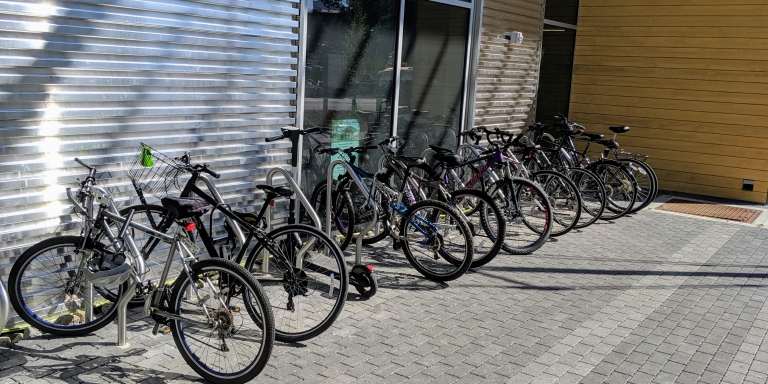 Fully utilized bike racks in front of the building.