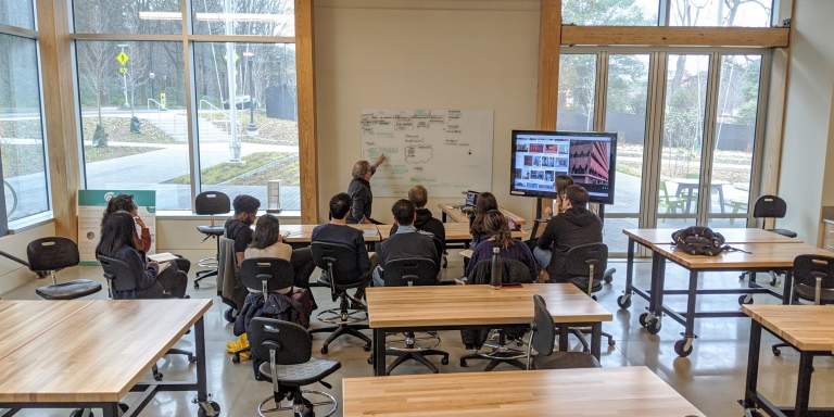 Professor Michael Gamble teaching a course in the design studio.