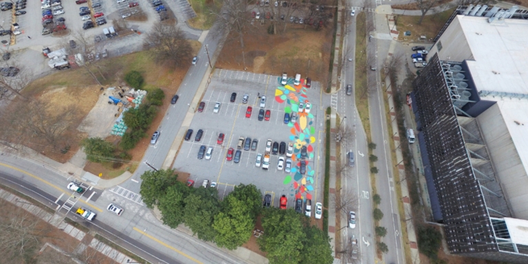 On September 8, 2017 over 50 members of the Georgia Tech community painted a mural on the future Kendeda Building site as part of the Office of Campus Sustainability’s Planting the Seeds event series celebrating the building’s launch. This event was a nod to the Beauty Petal: it educated student volunteers about the project and beautified the parking lot on which the building would be constructed.