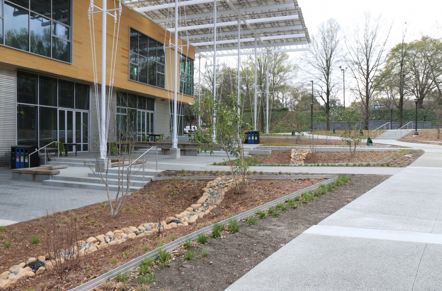 The building is surrounded with pervious surfaces and bioswales that allow for water to slowly seep into the ground.