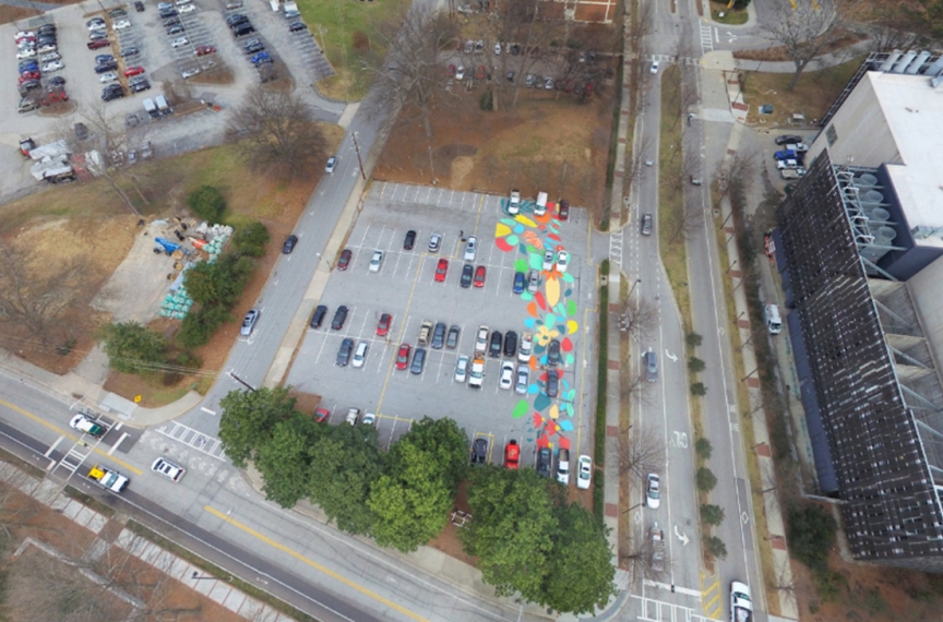 On September 8, 2017 over 50 members of the Georgia Tech community painted a mural on the future Kendeda Building site as part of the Office of Campus Sustainability’s Planting the Seeds event series celebrating the building’s launch. This event was a nod to the Beauty Petal: it educated student volunteers about the project and beautified the parking lot on which the building would be constructed.