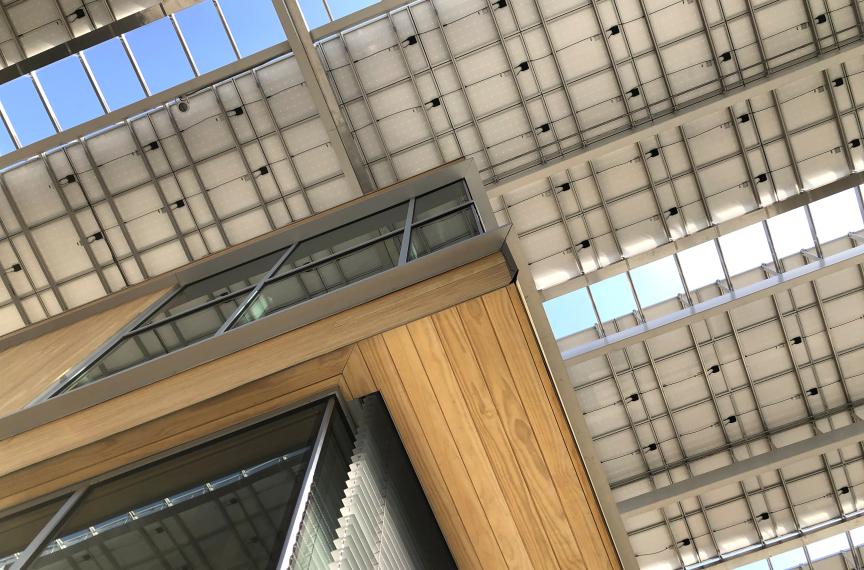 In addition to generating electricity, the solar canopy reduces energy consumption by providing shade for the building. Photo Credit: Miller Hull Partnership.