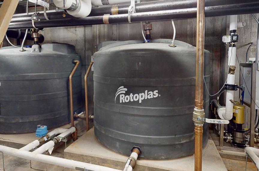 two 50,000 gallon cisterns in the basement of the building for holding water