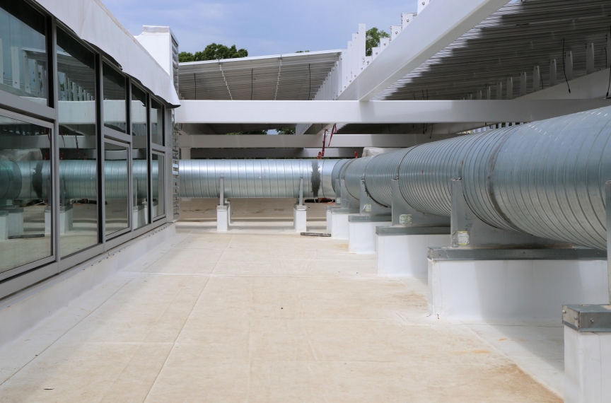 Exterior ducts transfer fresh air from the DOAS into the building.