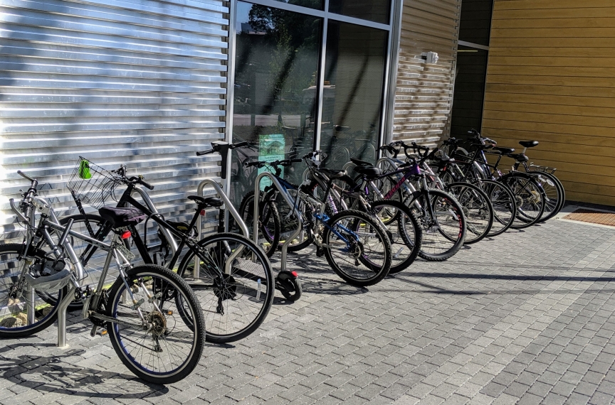 Fully utilized bike racks in front of the building.